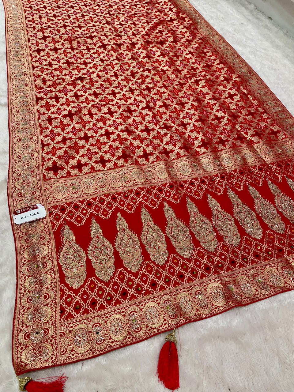 AJ-LILA GEORGETTE FABRIC SAREE WITH RICH PALLU DESIGN WITH EMBROIDERY WORK WITH BEAUTIFUL BANDHANI DESIGN ALL OVER ON SAREE WITH HEAVY SIROSKI WORK ON SAREE WITH TASSELS