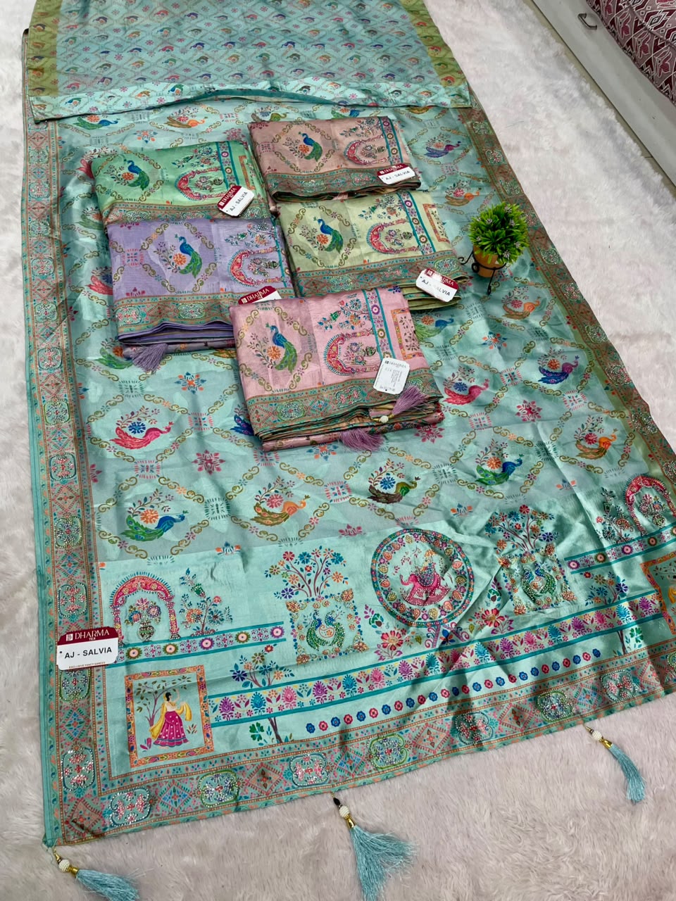 AJ-SALVIA SOFT SILK SAREE WITH BEAUTIFUL PEACOCK DESIGN ALL OVER BODY WITH JARKAN WORK WITH TASSELS AND PRINTED BLOUSE