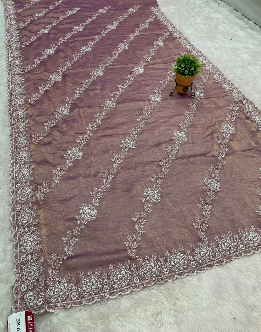 BS-AKASH FANCY FABRIC SAREE WITH HEAVY THREAD EMBROIDERY WITH SEQUENCE AND ELEGANT DIAGONAL FLORAL PATTERN ALL OVER SAREE WITH RICH EMBROIDERED SCALLOP BORDER WITH MATCHING DESIGNER BLOUSE WITH EMBROIDERY WORK