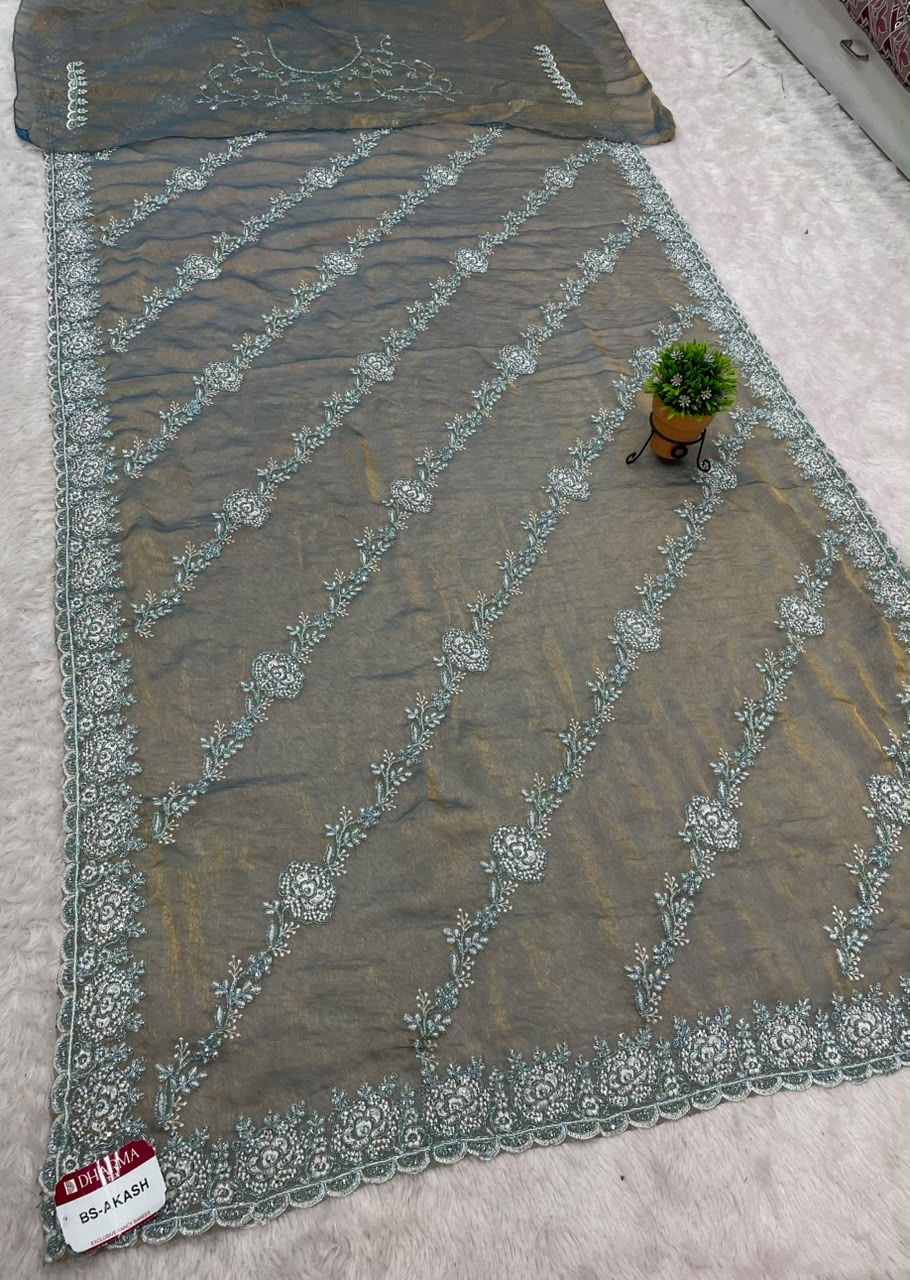 BS-AKASH FANCY FABRIC SAREE WITH HEAVY THREAD EMBROIDERY WITH SEQUENCE AND ELEGANT DIAGONAL FLORAL PATTERN ALL OVER SAREE WITH RICH EMBROIDERED SCALLOP BORDER WITH MATCHING DESIGNER BLOUSE WITH EMBROIDERY WORK