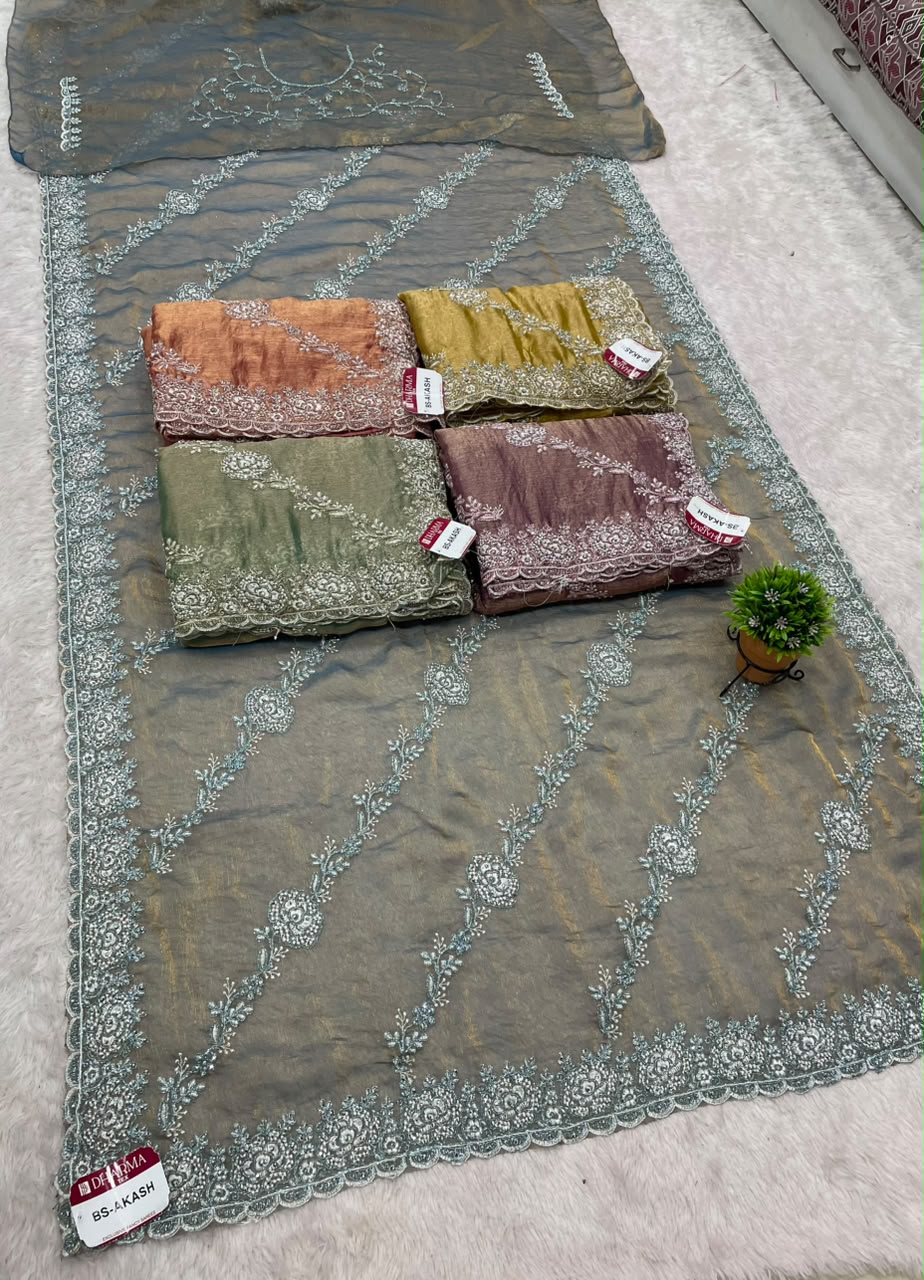 BS-AKASH FANCY FABRIC SAREE WITH HEAVY THREAD EMBROIDERY WITH SEQUENCE AND ELEGANT DIAGONAL FLORAL PATTERN ALL OVER SAREE WITH RICH EMBROIDERED SCALLOP BORDER WITH MATCHING DESIGNER BLOUSE WITH EMBROIDERY WORK