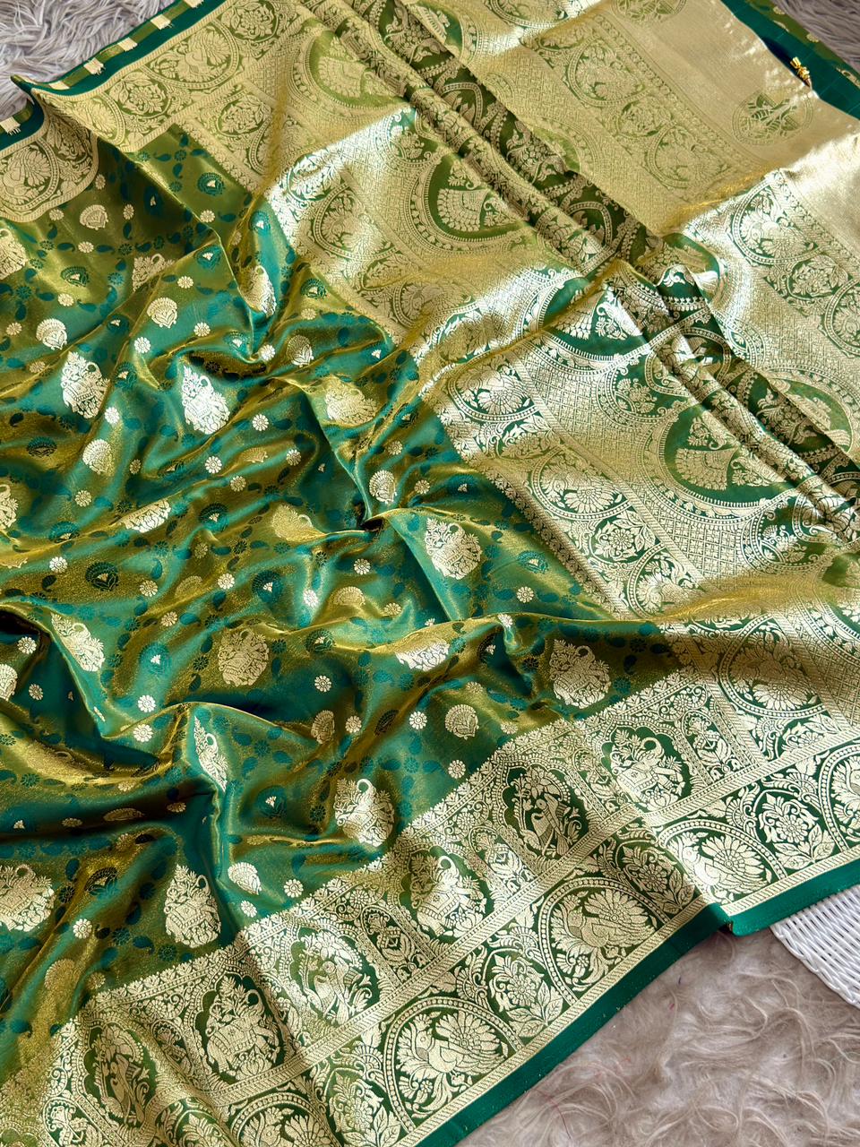 SA-5103 SOFT SILK FABRIC SAREE WITH NTRICATE GOLD ZARI WOVEN BUTA MOTIFS WITH BEAUTIFUL GAJRAJ DESIGN WITH HEAVY TRADITIONAL GOLD ZARI DESIGNER BORDER AND RICH GOLD ZARI PALLU WITH TRADITIONAL WEAVING