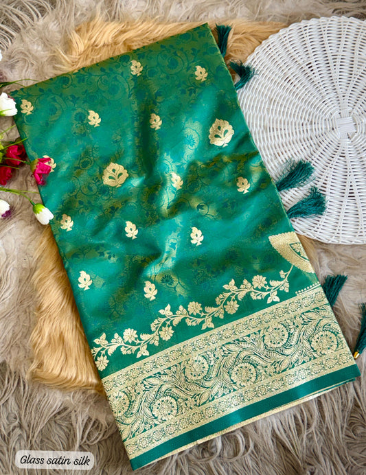 SA-5108 GLASS SATIN SILK FABRIC SAREE WITH FEATURING EXQUISTIE SILVER ZARI WEAVING WITH ELEGANT FLORAL PAISLY MOTIFS AND RICH WOVEN PALLU WITH AND A GRAND DESIGNER BORDER