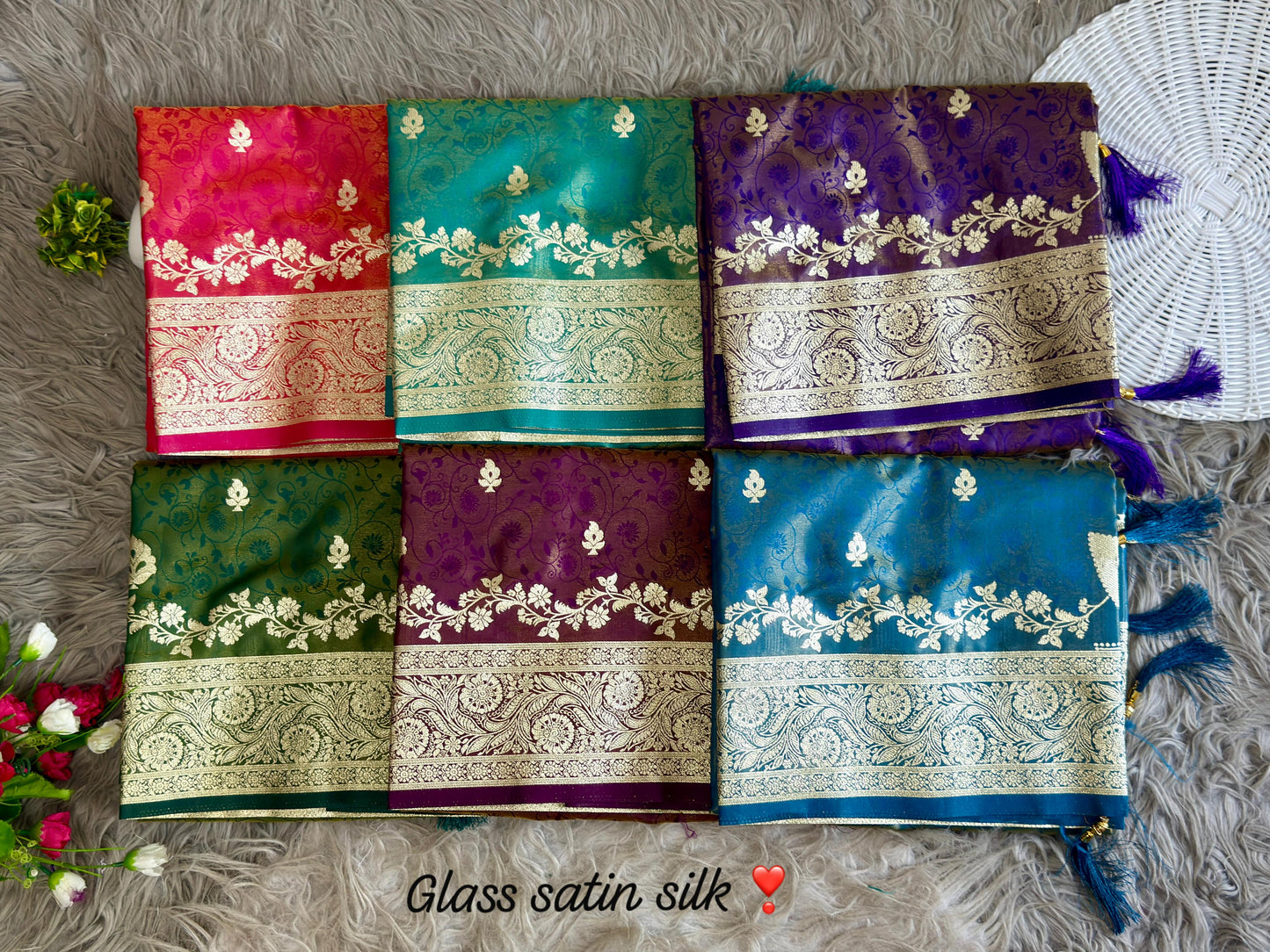 SA-5108 GLASS SATIN SILK FABRIC SAREE WITH FEATURING EXQUISTIE SILVER ZARI WEAVING WITH ELEGANT FLORAL PAISLY MOTIFS AND RICH WOVEN PALLU WITH AND A GRAND DESIGNER BORDER