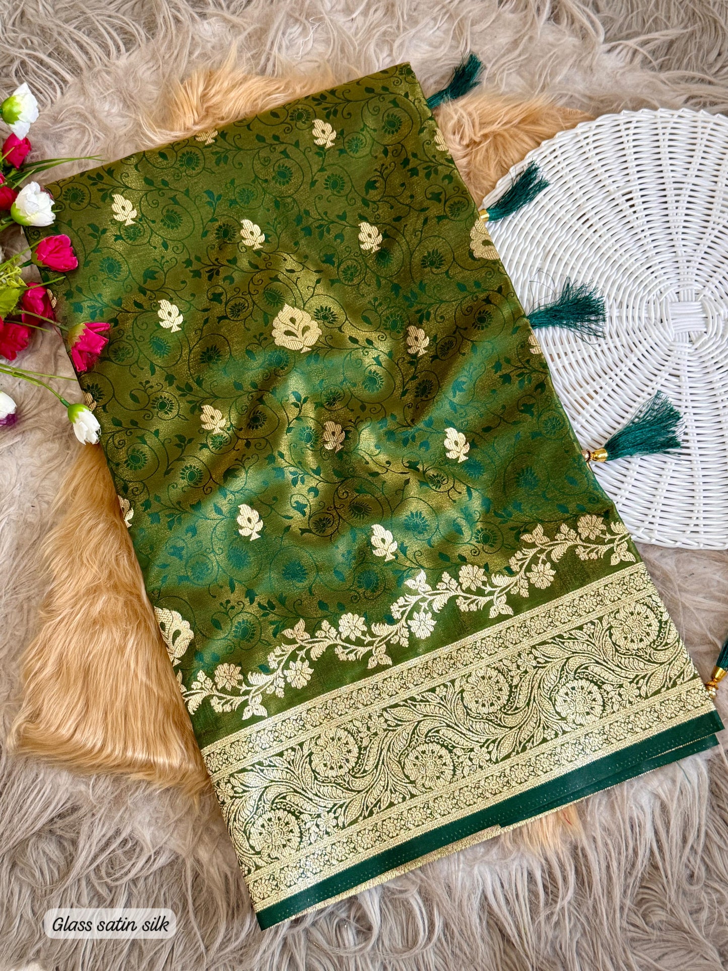 SA-5108 GLASS SATIN SILK FABRIC SAREE WITH FEATURING EXQUISTIE SILVER ZARI WEAVING WITH ELEGANT FLORAL PAISLY MOTIFS AND RICH WOVEN PALLU WITH AND A GRAND DESIGNER BORDER