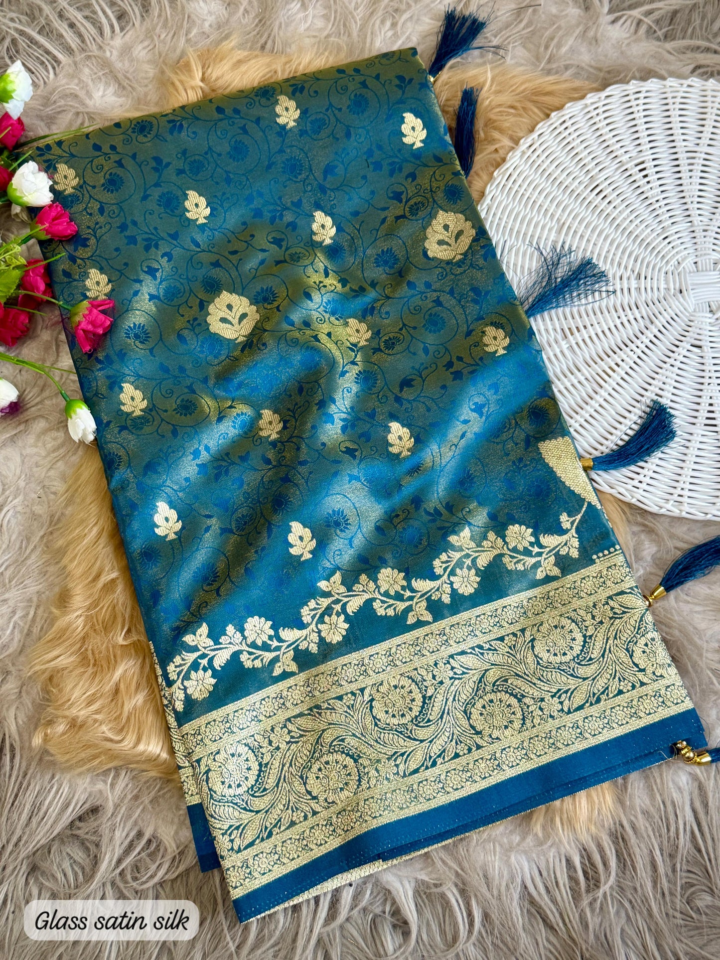 SA-5108 GLASS SATIN SILK FABRIC SAREE WITH FEATURING EXQUISTIE SILVER ZARI WEAVING WITH ELEGANT FLORAL PAISLY MOTIFS AND RICH WOVEN PALLU WITH AND A GRAND DESIGNER BORDER