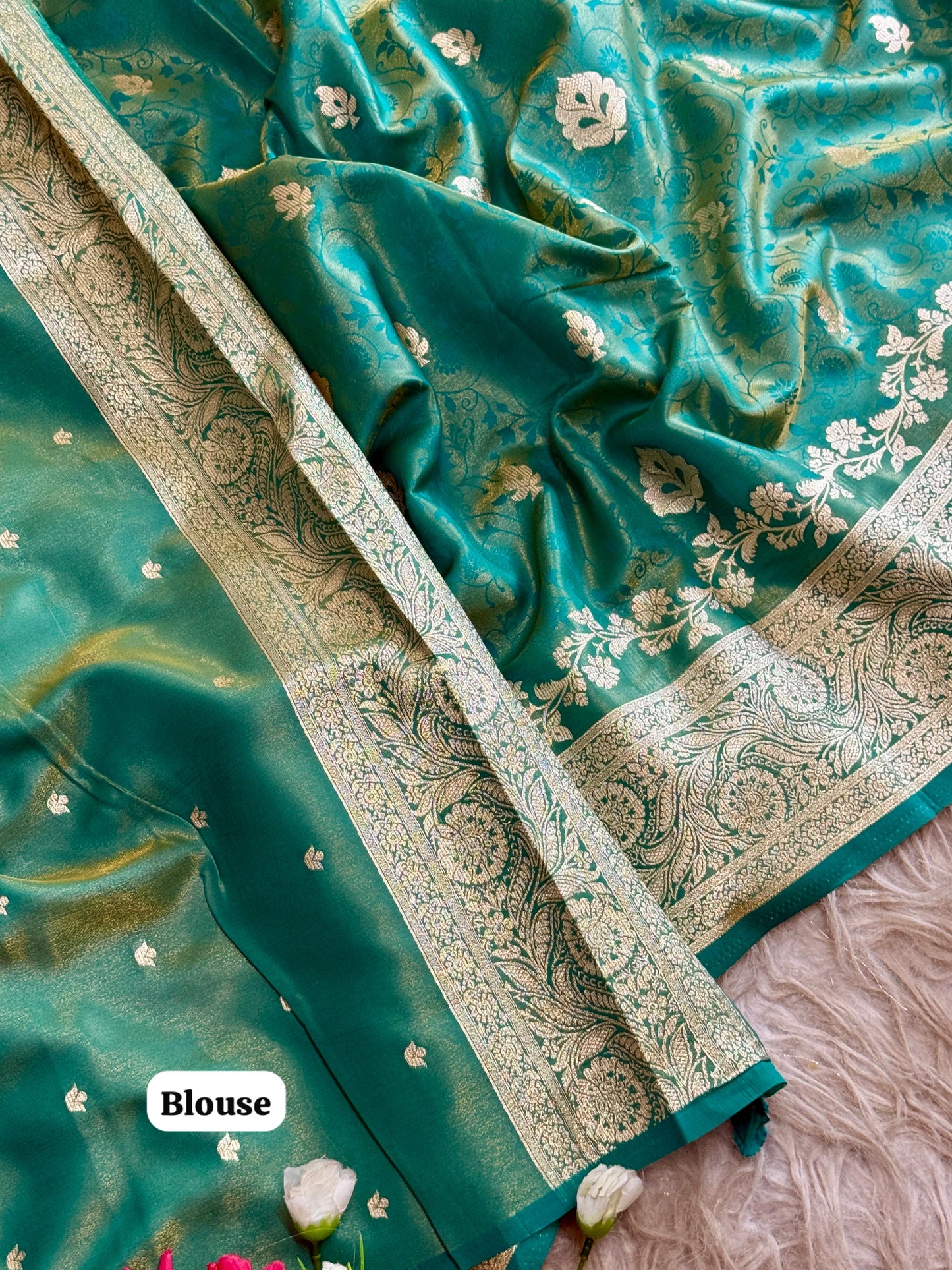 SA-5108 GLASS SATIN SILK FABRIC SAREE WITH FEATURING EXQUISTIE SILVER ZARI WEAVING WITH ELEGANT FLORAL PAISLY MOTIFS AND RICH WOVEN PALLU WITH AND A GRAND DESIGNER BORDER