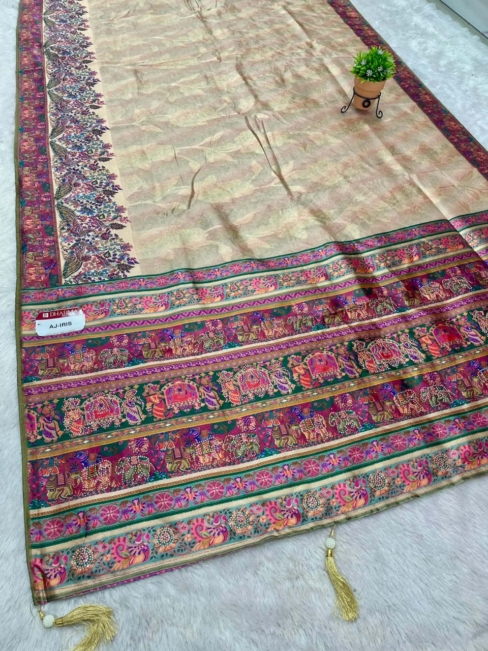 AJ-IRIS FANCY FABRIC SAREE WITH BEAUTIFUL PRINT  WITH DMC SIROSKI WORK WITH MEENAKARI WORK WITH BEAUTIFUL PEACOCK AND GAJRAJ DESIGN WITH PIPING AND LATKAN WITH BLOUSE