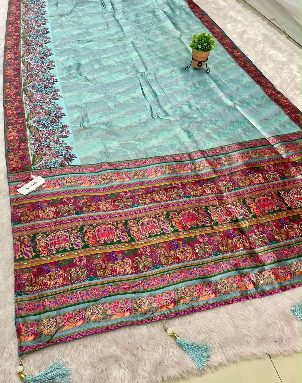 AJ-IRIS FANCY FABRIC SAREE WITH BEAUTIFUL PRINT  WITH DMC SIROSKI WORK WITH MEENAKARI WORK WITH BEAUTIFUL PEACOCK AND GAJRAJ DESIGN WITH PIPING AND LATKAN WITH BLOUSE