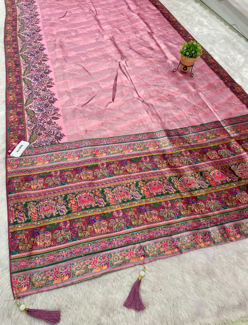 AJ-IRIS FANCY FABRIC SAREE WITH BEAUTIFUL PRINT  WITH DMC SIROSKI WORK WITH MEENAKARI WORK WITH BEAUTIFUL PEACOCK AND GAJRAJ DESIGN WITH PIPING AND LATKAN WITH BLOUSE