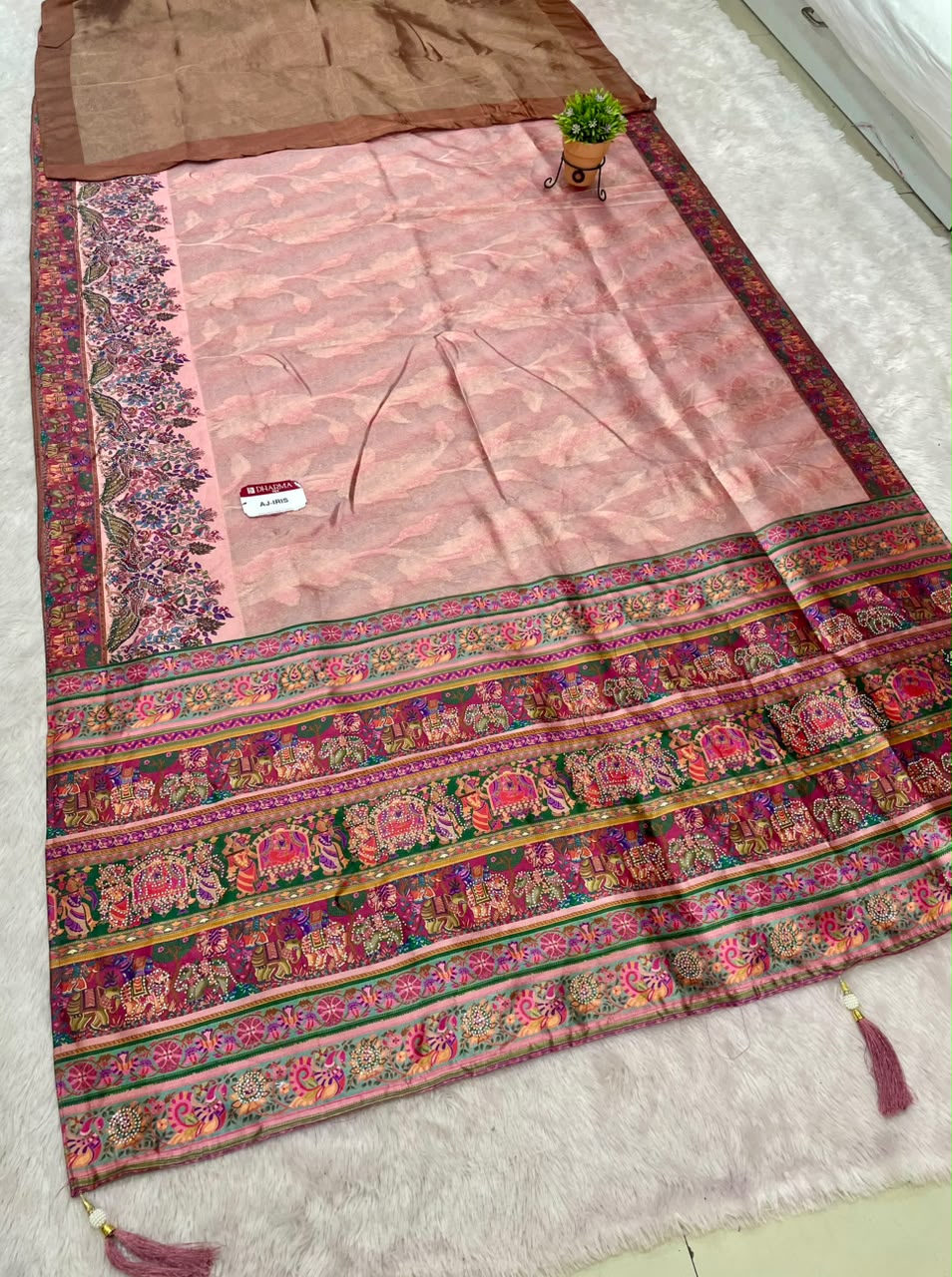 AJ-IRIS FANCY FABRIC SAREE WITH BEAUTIFUL PRINT  WITH DMC SIROSKI WORK WITH MEENAKARI WORK WITH BEAUTIFUL PEACOCK AND GAJRAJ DESIGN WITH PIPING AND LATKAN WITH BLOUSE