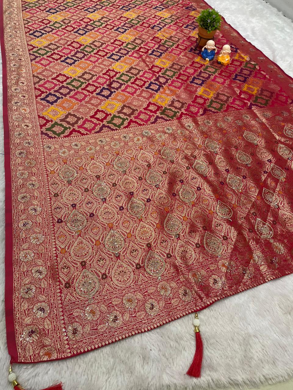AJ-MOKSHA SATIN SILK FABRIC SAREE WITH RICH PALLU DESIGN WITH HEAVY JARKAN WORK WITH PANGKAT DESIGN ON BODY WITH TASSELS AND BLOUSE