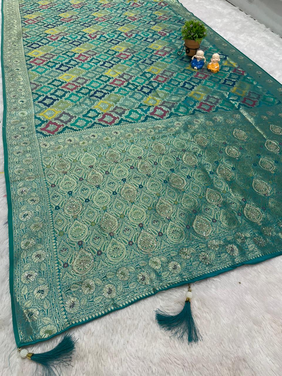 AJ-MOKSHA SATIN SILK FABRIC SAREE WITH RICH PALLU DESIGN WITH HEAVY JARKAN WORK WITH PANGKAT DESIGN ON BODY WITH TASSELS AND BLOUSE