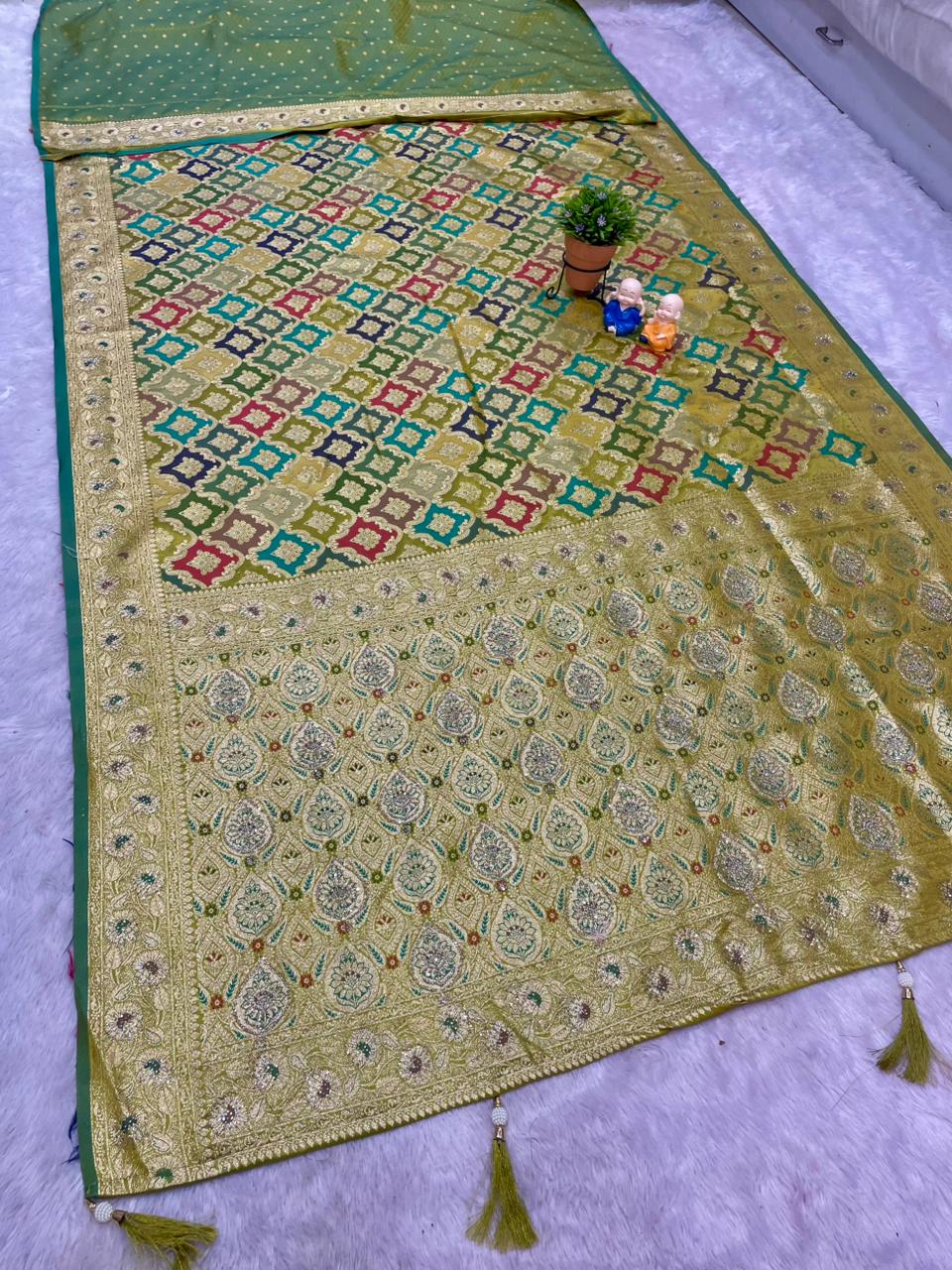 AJ-MOKSHA SATIN SILK FABRIC SAREE WITH RICH PALLU DESIGN WITH HEAVY JARKAN WORK WITH PANGKAT DESIGN ON BODY WITH TASSELS AND BLOUSE