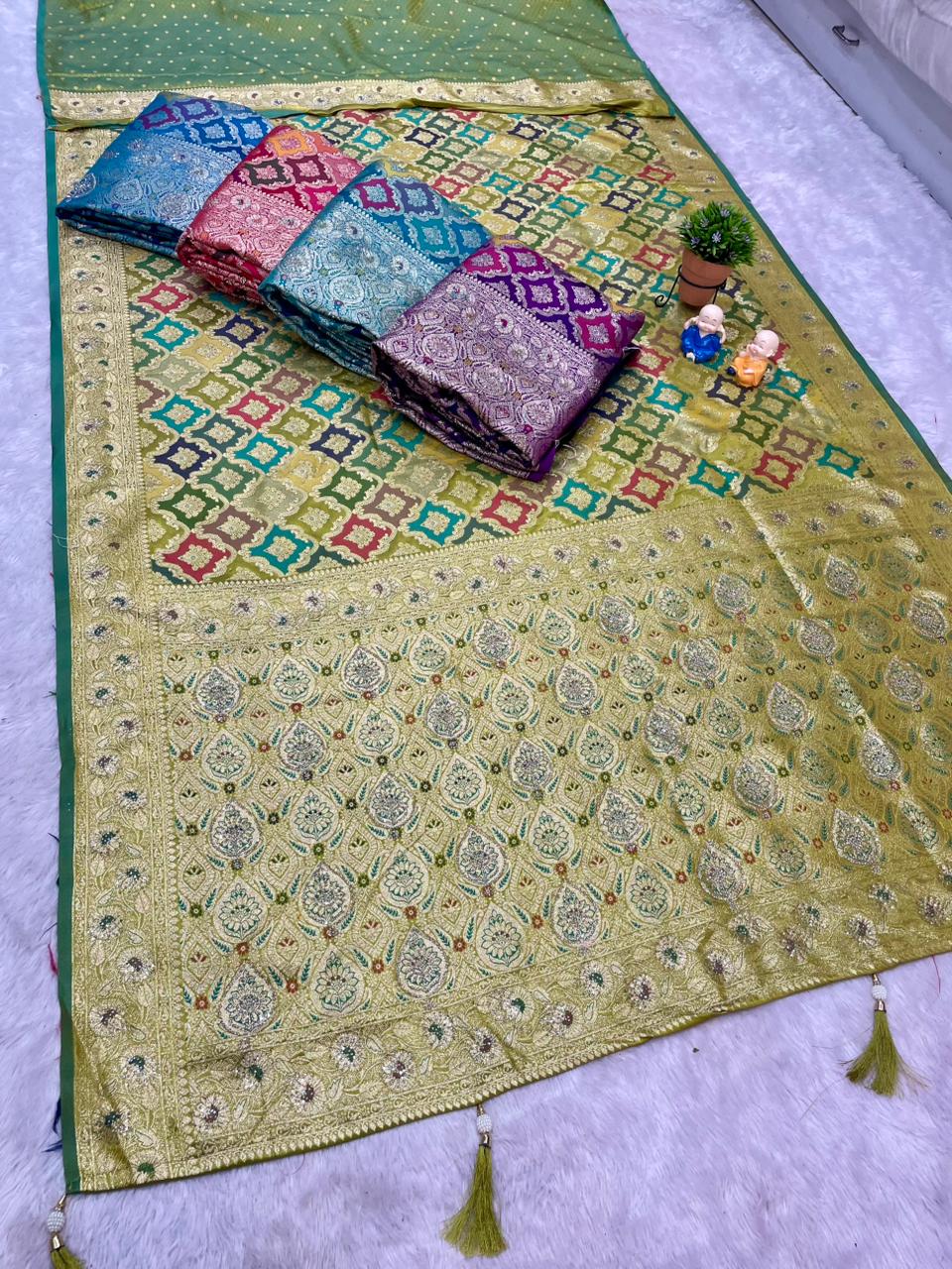 AJ-MOKSHA SATIN SILK FABRIC SAREE WITH RICH PALLU DESIGN WITH HEAVY JARKAN WORK WITH PANGKAT DESIGN ON BODY WITH TASSELS AND BLOUSE