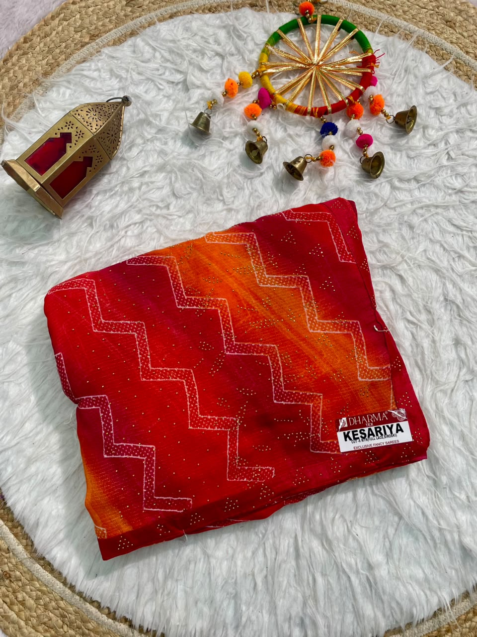 KESARIYA-CATLOGUE WEIGHTLESS FABRIC SAREE WITH BEAUTIFUL LEHARIYA DESIGN WITH DMC SIROSKI WORK ALL OVER ON SAREE WITH BLOUSE