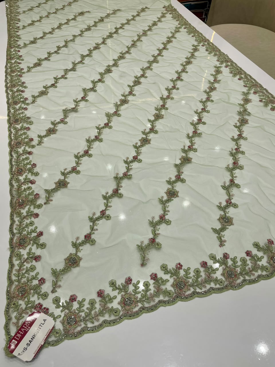BS-SHAKUNTALA  PREMIUM NET FABRIC SAREE WITH BEUATIFUL EMBROIDERY WORK WITH BEAUTIFUL LEHARIYA DESIGN WIRH DIAMOND WORK WITH HEAVY BLOUSE