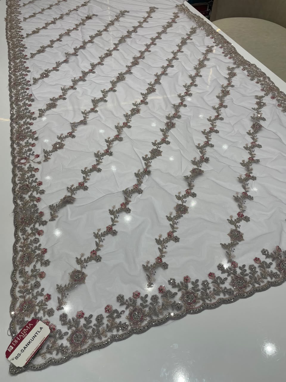 BS-SHAKUNTALA  PREMIUM NET FABRIC SAREE WITH BEUATIFUL EMBROIDERY WORK WITH BEAUTIFUL LEHARIYA DESIGN WIRH DIAMOND WORK WITH HEAVY BLOUSE