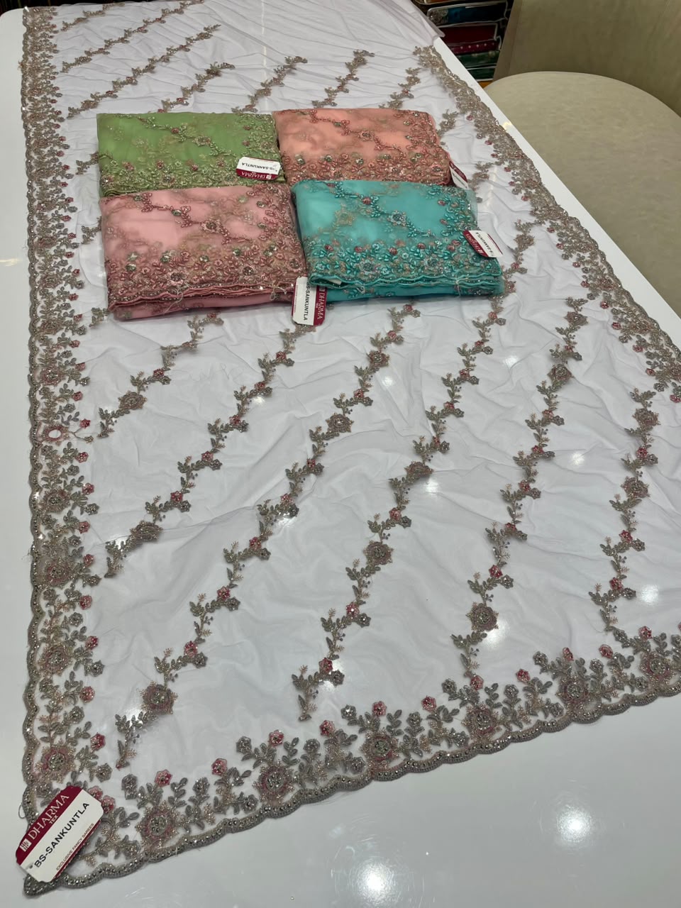 BS-SHAKUNTALA  PREMIUM NET FABRIC SAREE WITH BEUATIFUL EMBROIDERY WORK WITH BEAUTIFUL LEHARIYA DESIGN WIRH DIAMOND WORK WITH HEAVY BLOUSE