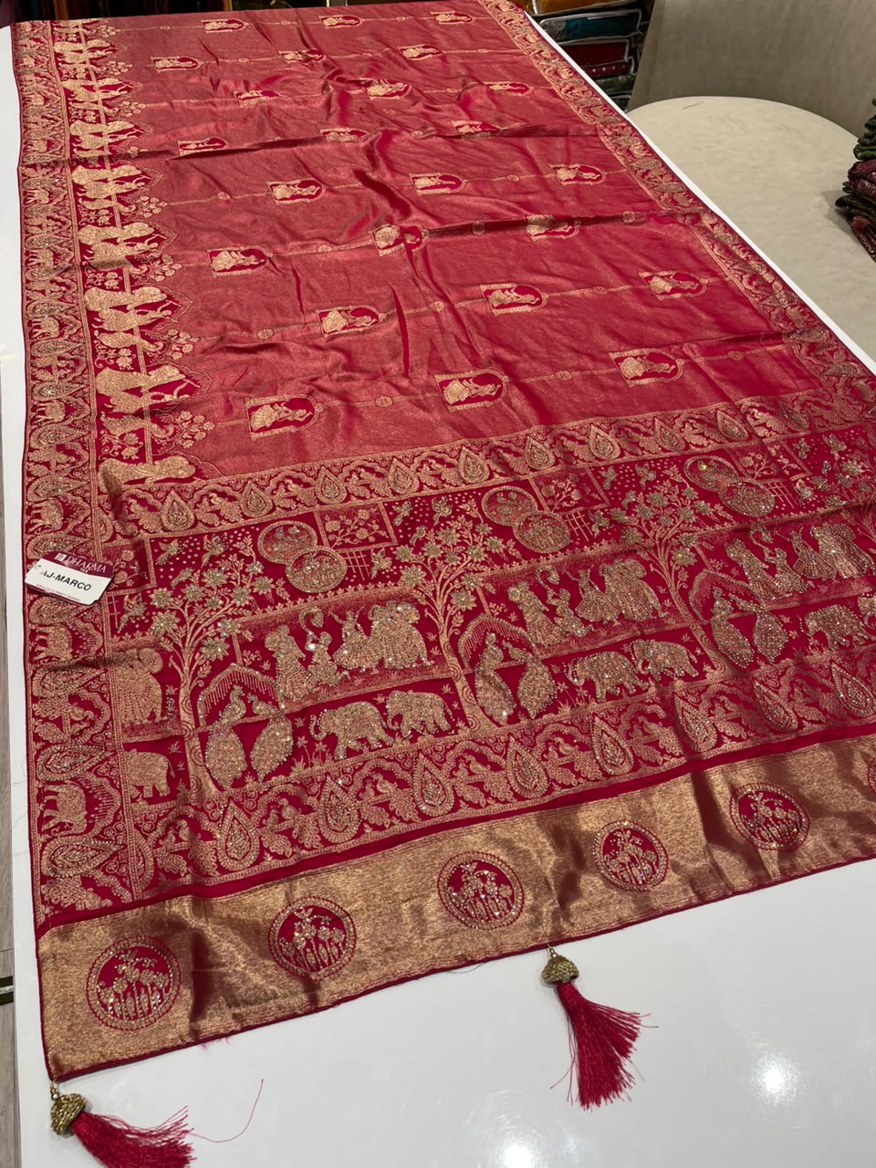 AJ-MARCO TISSUE FABRIC SAREE WITH HEAVY RICH PALLU DEISGN WITH JARKAN WORK WITH LAGNI PATTA WITH BEAUTIFUL DESIGN ON PALLU WITH PIPING AND TASSELS WITH BLOUSE