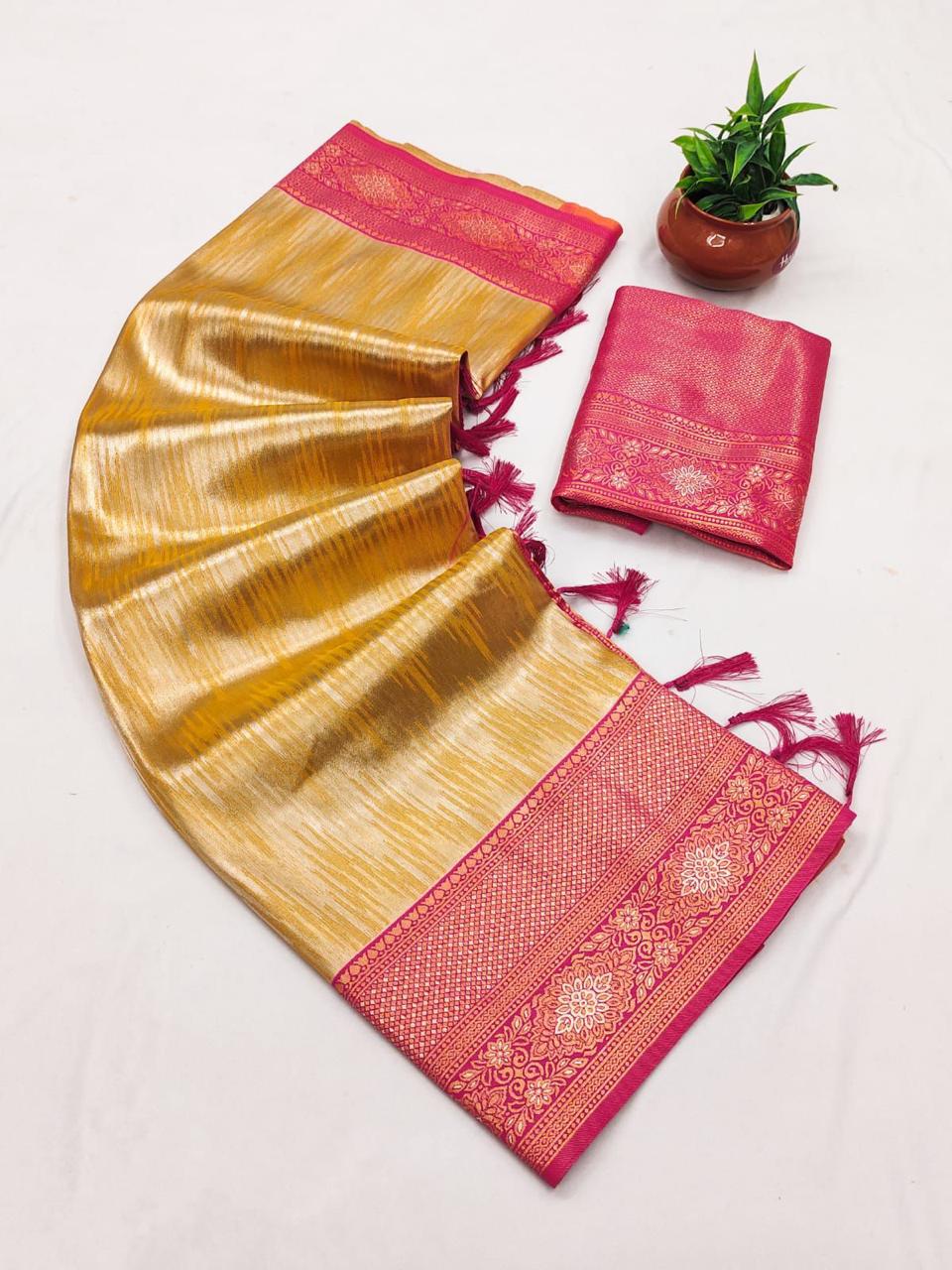 SA-5112 TISSUE SILK FABRIC SAREE WITH RICH JACQUARD ZARI WEAVING PALLU WITH TASSELS WITH RICH GOLD ZARI WEAVING AND EAVY ZARI WOVEN BORDER