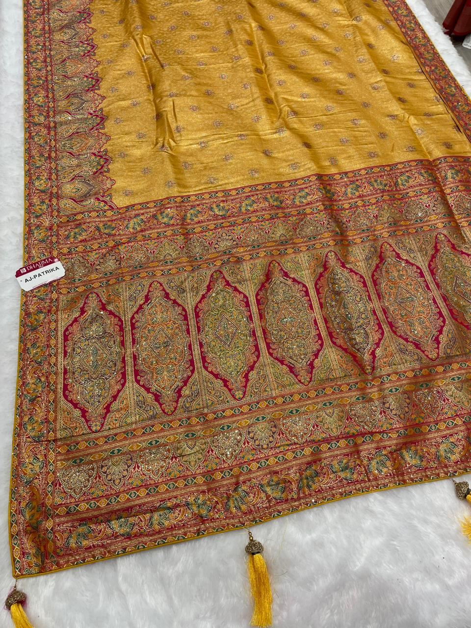 AJ-PATRIKA PREMIUM TISSUE SILK WITH POSITION STYLE WEAVING WITH HEAVY JARKAN WORK WITH CONTRAST PIPING AND LATKAN WITH BROCADE BLOUSE