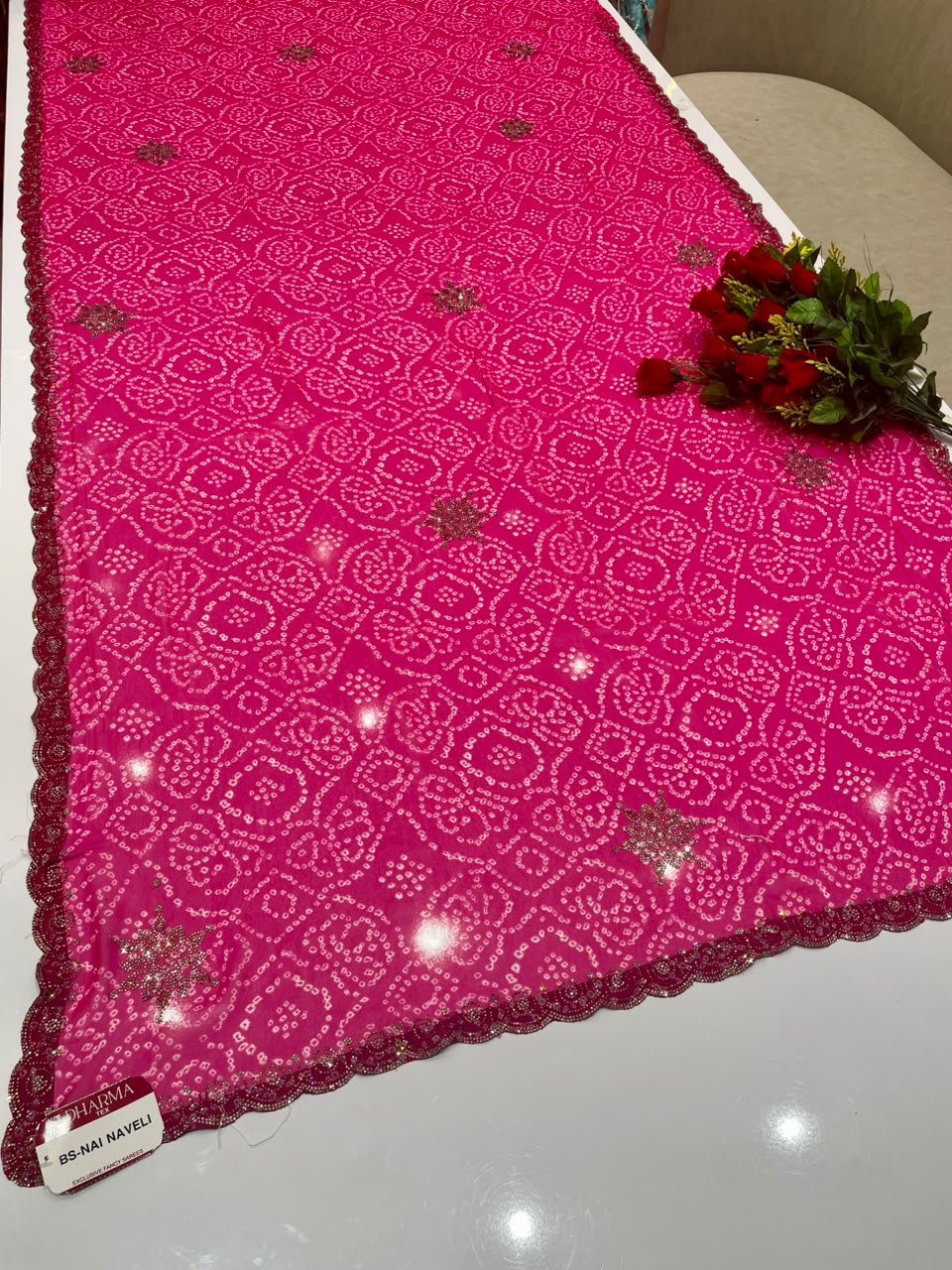 BS-NAI NAVELI BANDHANI FABRIC SAREE WITH HEAVY DMC SIROSKI WORK ALL OVER ON SAREE WITH BEAUTIFUL BANDHANI DESIGN ON SAREE WITH BLOUSE