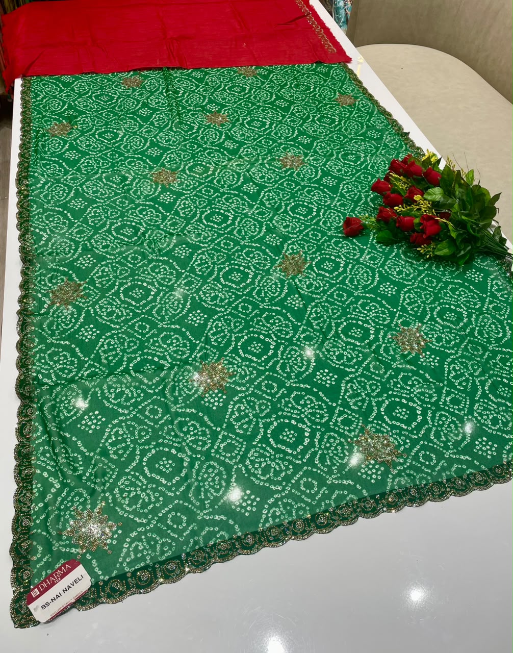 BS-NAI NAVELI BANDHANI FABRIC SAREE WITH HEAVY DMC SIROSKI WORK ALL OVER ON SAREE WITH BEAUTIFUL BANDHANI DESIGN ON SAREE WITH BLOUSE