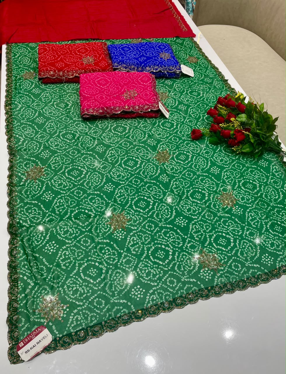BS-NAI NAVELI BANDHANI FABRIC SAREE WITH HEAVY DMC SIROSKI WORK ALL OVER ON SAREE WITH BEAUTIFUL BANDHANI DESIGN ON SAREE WITH BLOUSE