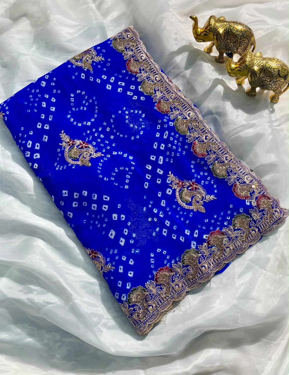 BS-JINGLE BELL  PURE CHIFFON FABRIC SAREE WITH BEAUTIFUL DESIGN WITH BANDHANI DESIGN WITH JARKAN WORK WITH CUT WORK WITH BLOUSE