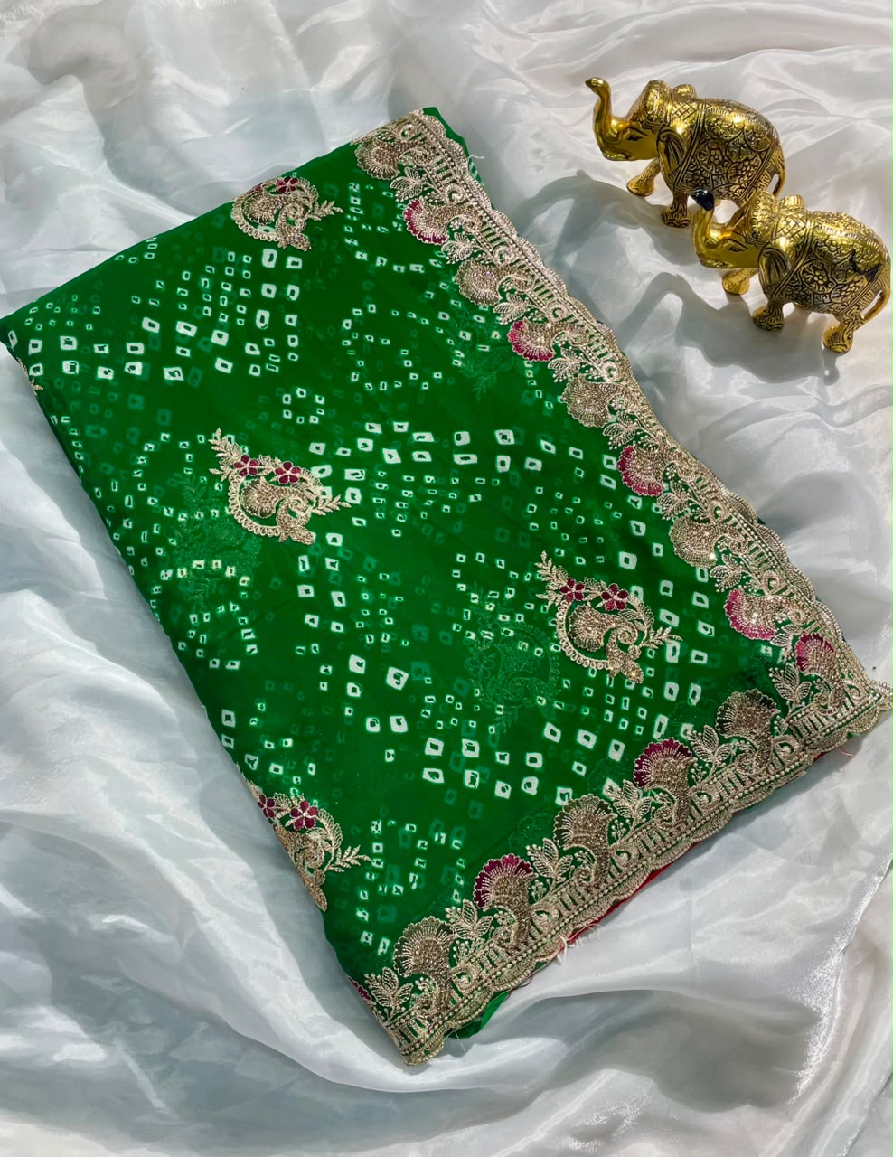 BS-JINGLE BELL  PURE CHIFFON FABRIC SAREE WITH BEAUTIFUL DESIGN WITH BANDHANI DESIGN WITH JARKAN WORK WITH CUT WORK WITH BLOUSE