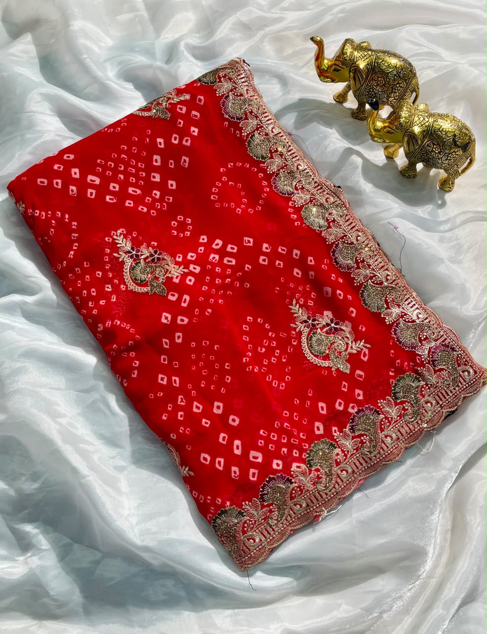 BS-JINGLE BELL  PURE CHIFFON FABRIC SAREE WITH BEAUTIFUL DESIGN WITH BANDHANI DESIGN WITH JARKAN WORK WITH CUT WORK WITH BLOUSE
