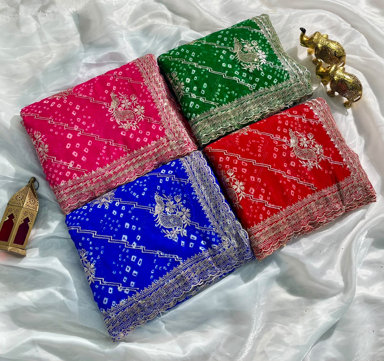 BS-POWER PLAY PURE CHIFFON FABRIC SAREE WITH BEAUTIFUL DESIGN WITH BANDHANI DESIGN WITH JARKAN WORK WITH CUT WORK WITH BLOUSE
