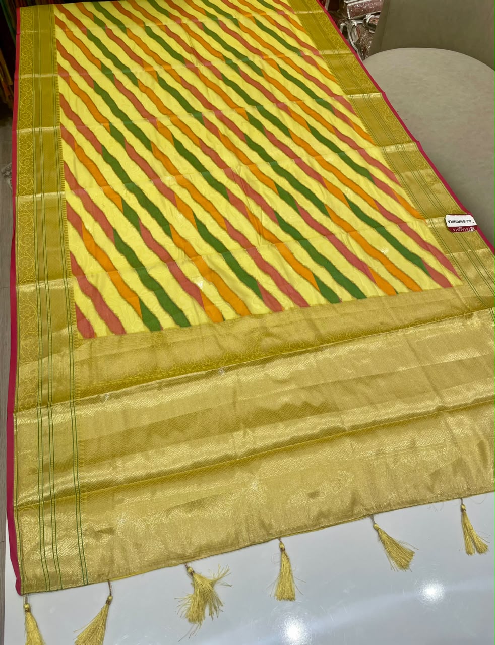 AJ-SHRINIKA FANCY FABRIC SAREE WITH LAHERIYA DESIGN WITH PIPING WITH BEAUTIFUL TASSELS WITH LOVELY BLOUSE