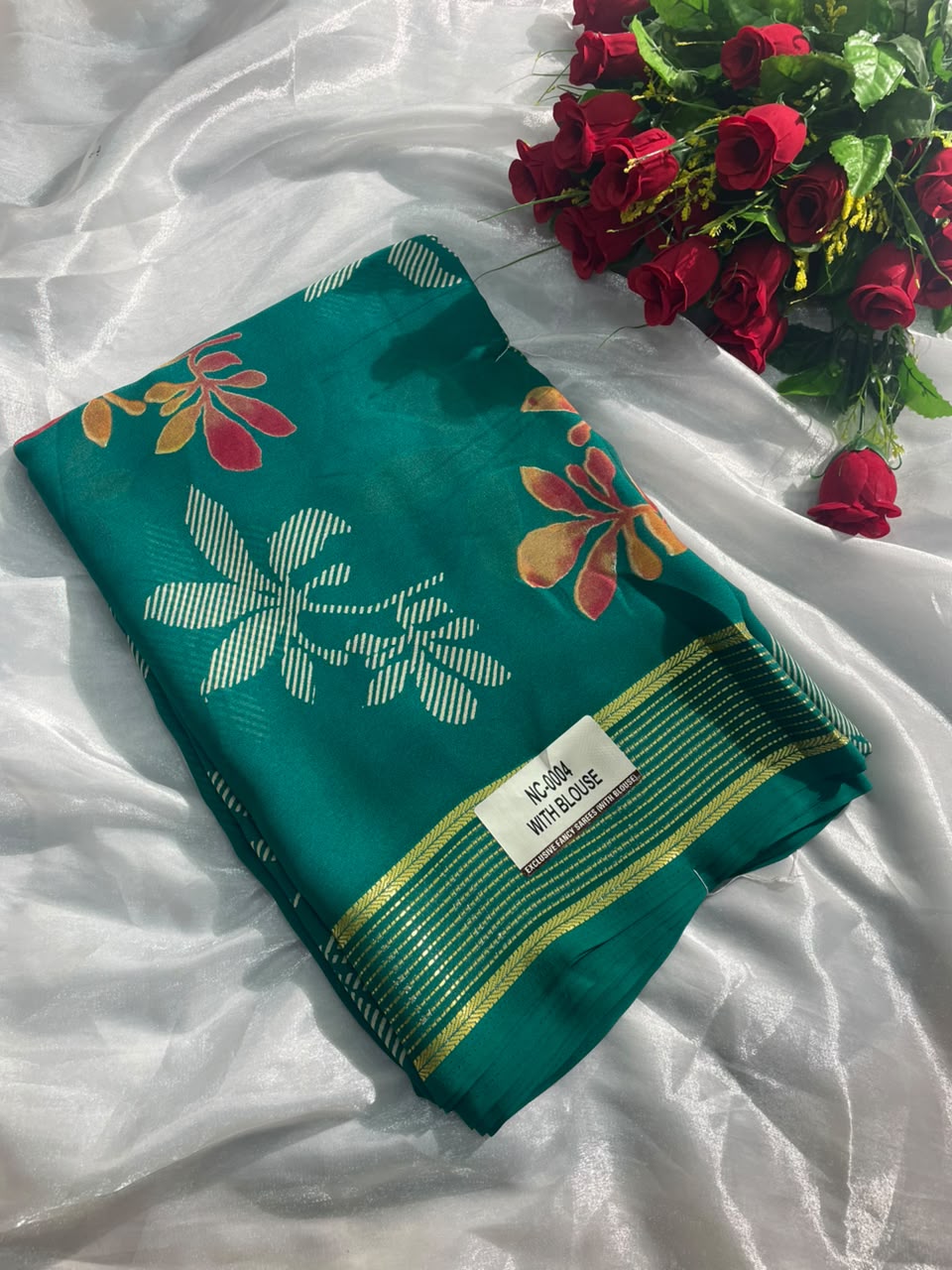 NC-0004  DULL MOSS FABRIC SAREE WITH RICH PALLU DESIGN WITH BEAUTIFUL RADHIKA BORDER WITH FLORAL DESIGN ON BODY WITH BLOUSE