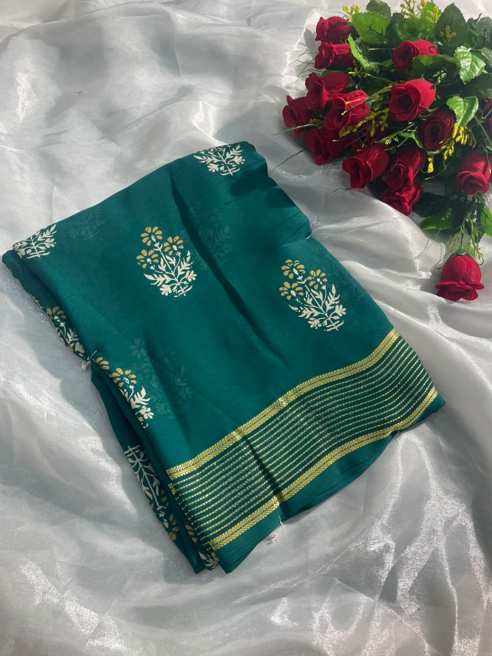NC-0004  DULL MOSS FABRIC SAREE WITH RICH PALLU DESIGN WITH BEAUTIFUL RADHIKA BORDER WITH FLORAL DESIGN ON BODY WITH BLOUSE