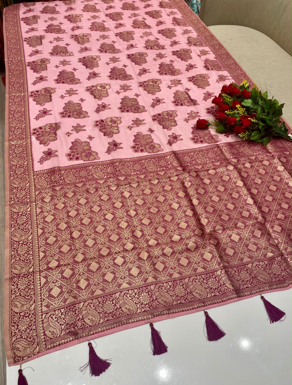 AJ-ZARINA-LIGHT FANCY FABRIC SAREE WITH HEAVY RICH PALLU DESIGN WITH FLORAL DESIGN ALL OVER ON BODY WITH PIPING AND TASSELS WITH BLOUSE