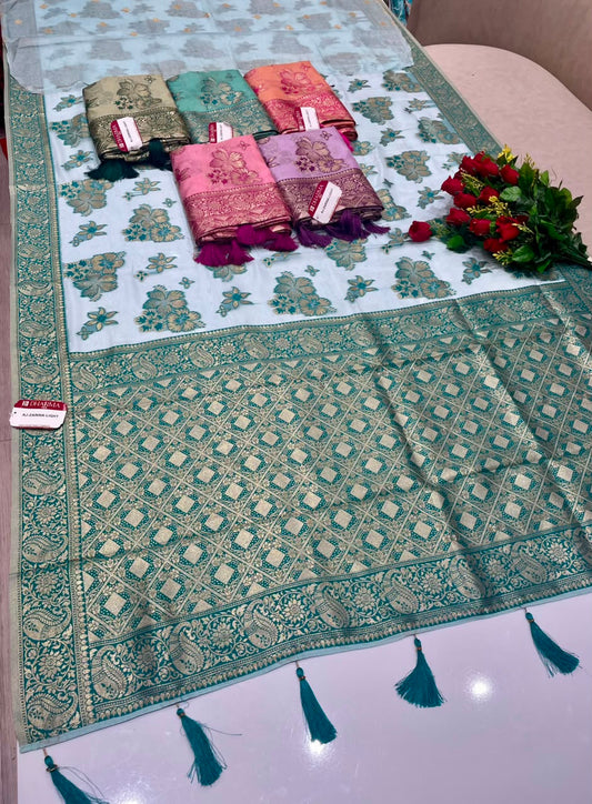 AJ-ZARINA-LIGHT FANCY FABRIC SAREE WITH HEAVY RICH PALLU DESIGN WITH FLORAL DESIGN ALL OVER ON BODY WITH PIPING AND TASSELS WITH BLOUSE