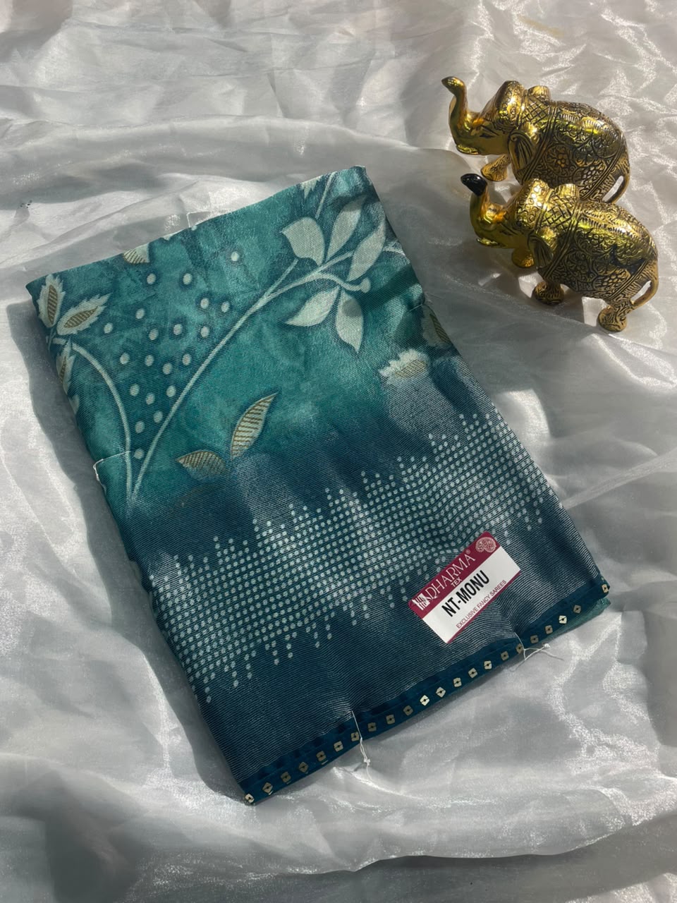 NT-MONU BRASSO FABRIC SAREE WITH RICH PALLU DESIGN WITH SEQUENCE BORDER WITH FLKORAL DESIGN ON BODY WITH BLOUSE