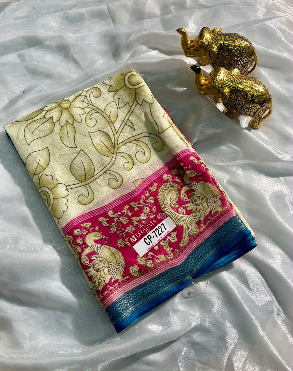 CP-7227 BURJ KHALIFA FABRIC SAREE WITH RICH PALLU DESIGN WITH BEAUTIFUL PRINT ON PALLU WITH PEACOCK DESIGN ON BORDER WITH FLORAL DESIGN ON BODY WITH BLOUSE