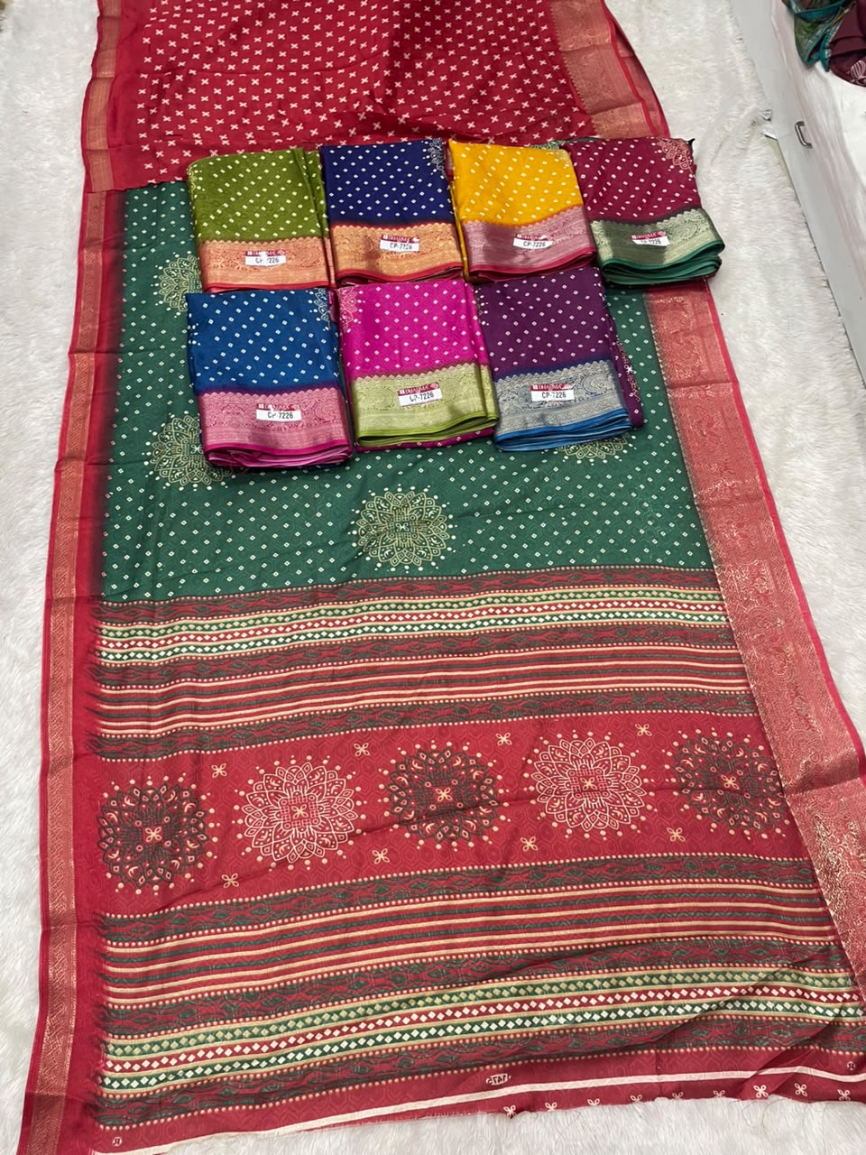 CP-7226 SOFT DOLA FABRIC SAREE WITH BEAUTIFUL DESIGN WITH RICH PALLU DESIGN WITH BLOUSE
