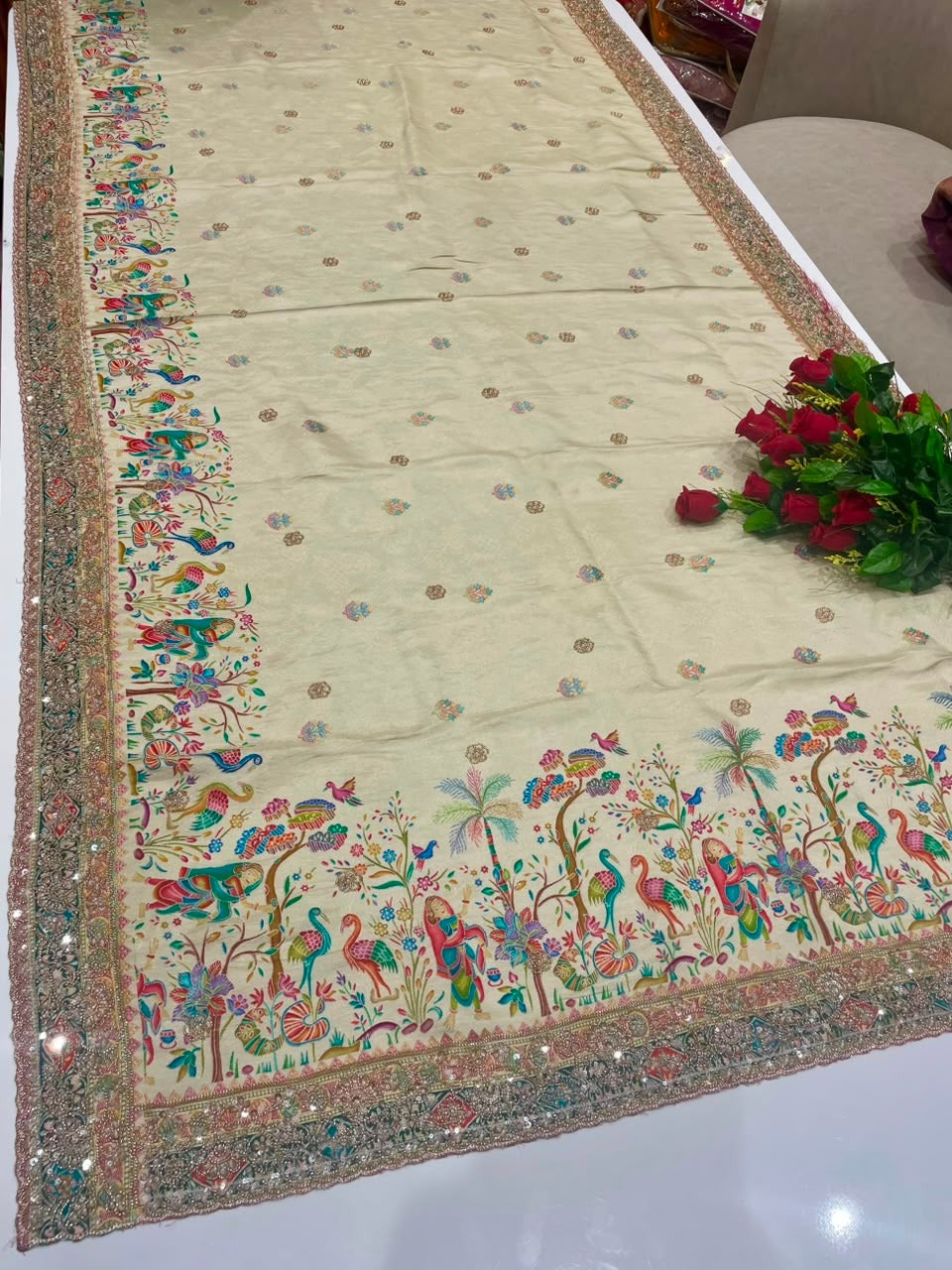 AJ-JIVIKA BEAUTIFUL POSITION FABRIC SAREE WITH HEAVY BEADS WORK ON ALL OVER BORDER WITH BODY AND PEACOCK PRINT WITH CONTRAST BLOUSE