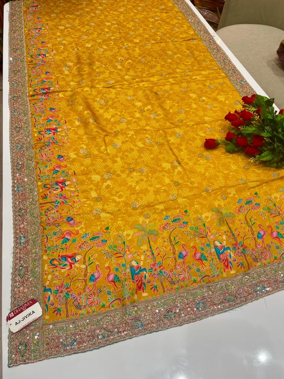 AJ-JIVIKA BEAUTIFUL POSITION FABRIC SAREE WITH HEAVY BEADS WORK ON ALL OVER BORDER WITH BODY AND PEACOCK PRINT WITH CONTRAST BLOUSE