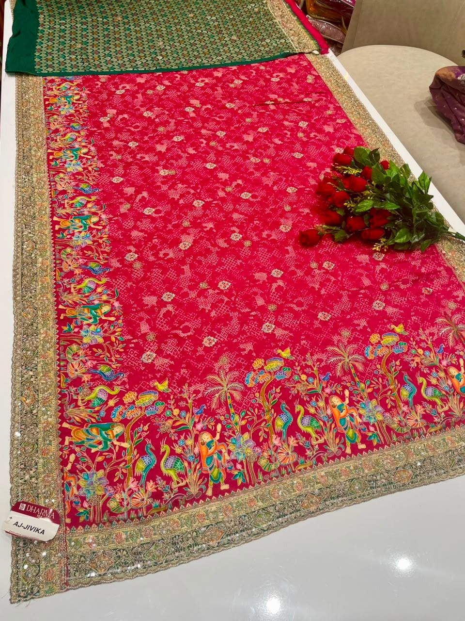 AJ-JIVIKA BEAUTIFUL POSITION FABRIC SAREE WITH HEAVY BEADS WORK ON ALL OVER BORDER WITH BODY AND PEACOCK PRINT WITH CONTRAST BLOUSE