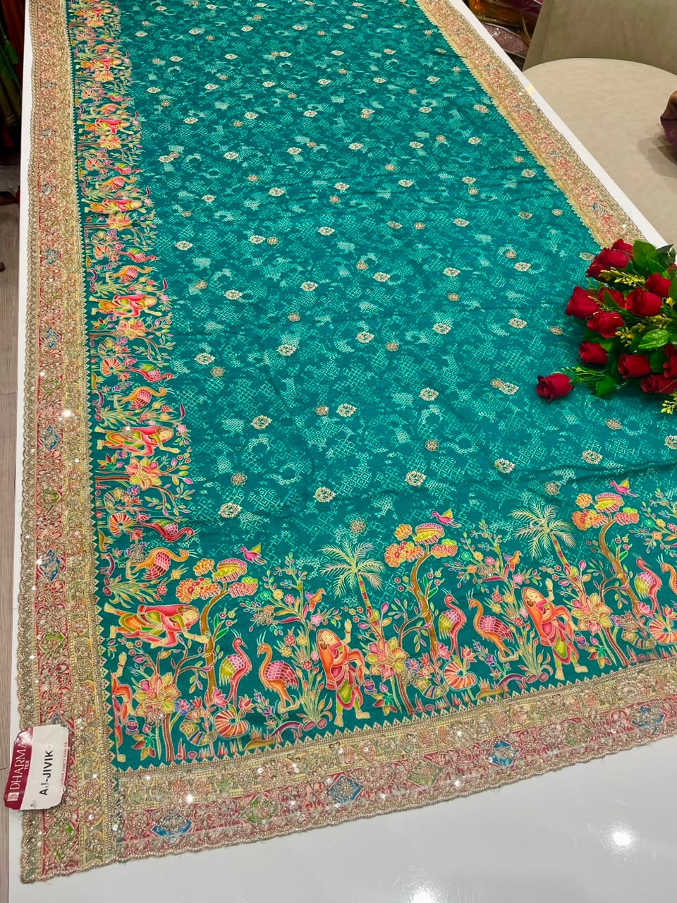 AJ-JIVIKA BEAUTIFUL POSITION FABRIC SAREE WITH HEAVY BEADS WORK ON ALL OVER BORDER WITH BODY AND PEACOCK PRINT WITH CONTRAST BLOUSE