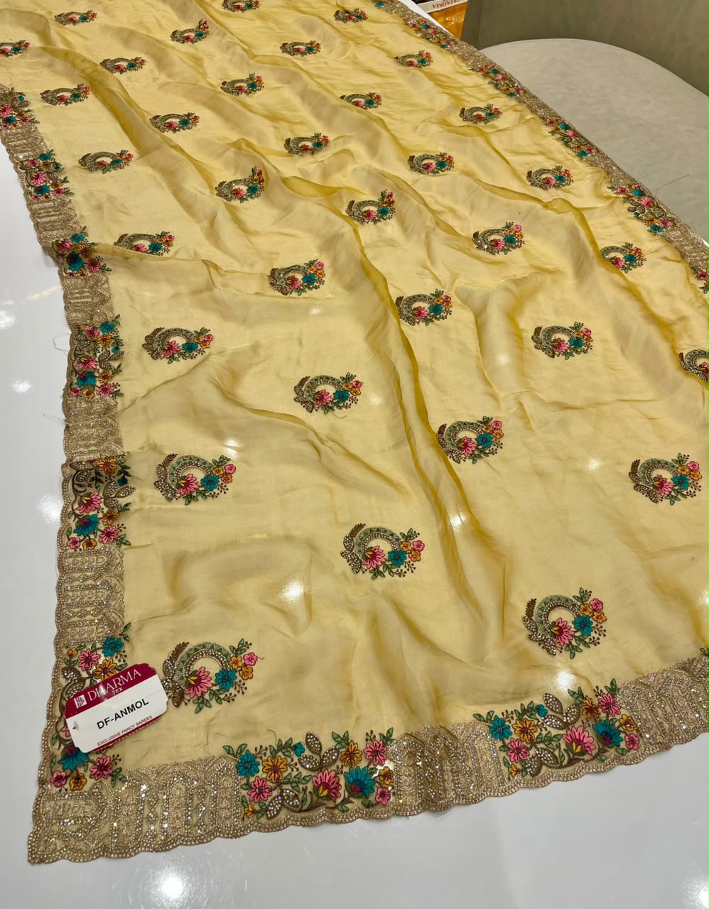DF-ANMOL SUFI FANCY FABRIC SAREE WITH PREMIUM DESIGN SAREE WITH HEAVY EMBROIDERY AND THRED WORK WITH HEAVY JARKAN WORK WITH HEAVY BUTTA ALL OVER ON SAREE WITH HEAVY BLOUSE