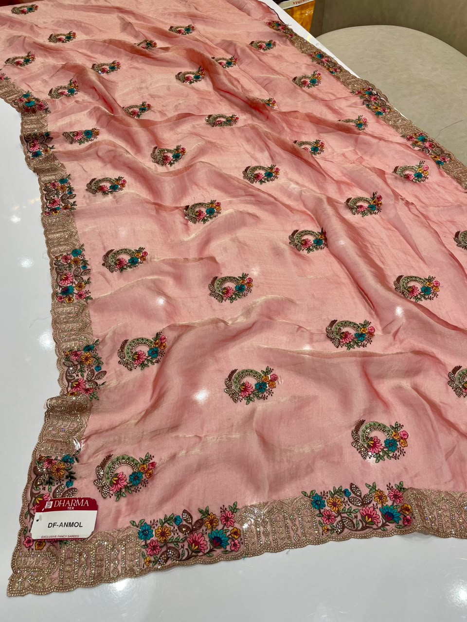 DF-ANMOL SUFI FANCY FABRIC SAREE WITH PREMIUM DESIGN SAREE WITH HEAVY EMBROIDERY AND THRED WORK WITH HEAVY JARKAN WORK WITH HEAVY BUTTA ALL OVER ON SAREE WITH HEAVY BLOUSE