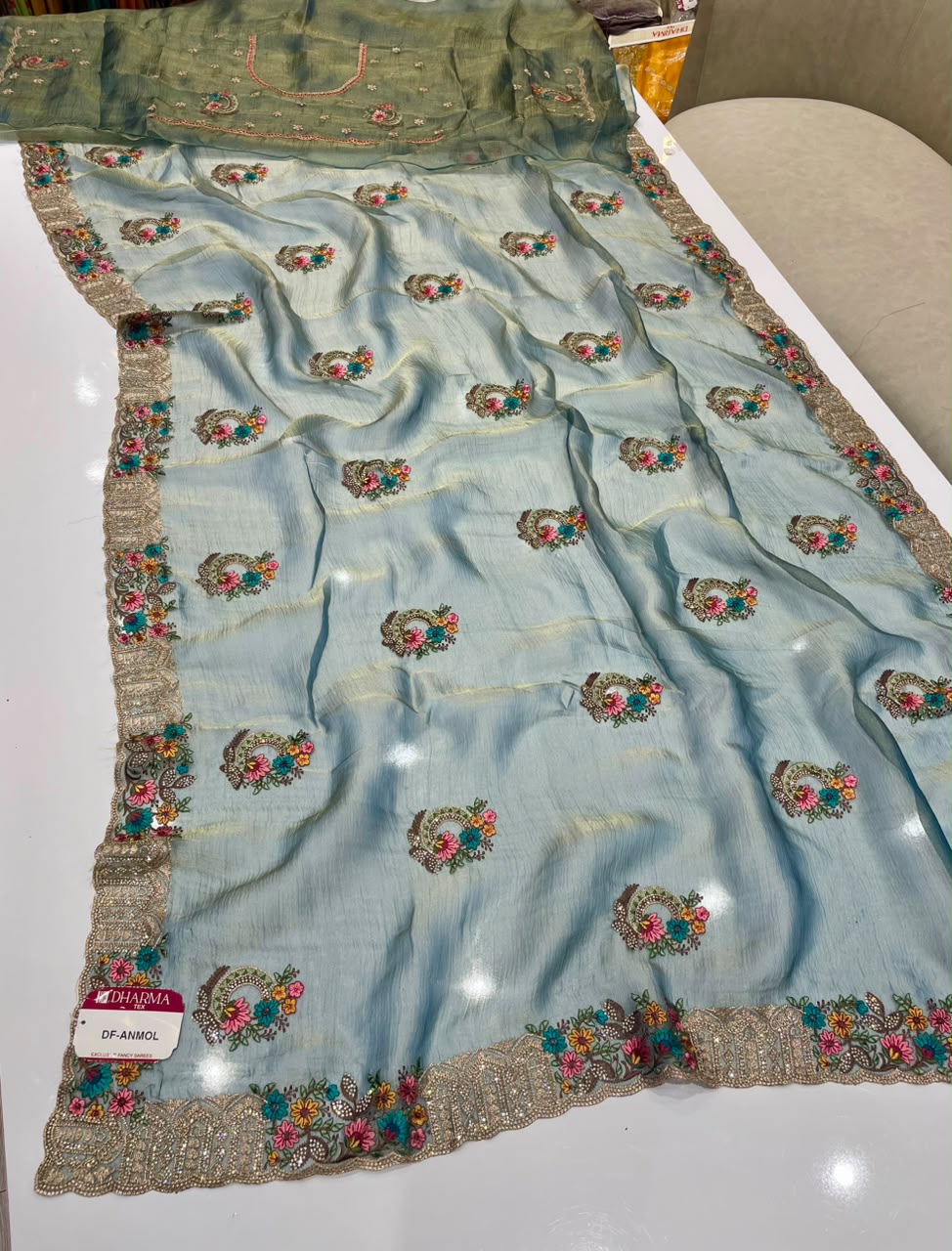 DF-ANMOL SUFI FANCY FABRIC SAREE WITH PREMIUM DESIGN SAREE WITH HEAVY EMBROIDERY AND THRED WORK WITH HEAVY JARKAN WORK WITH HEAVY BUTTA ALL OVER ON SAREE WITH HEAVY BLOUSE