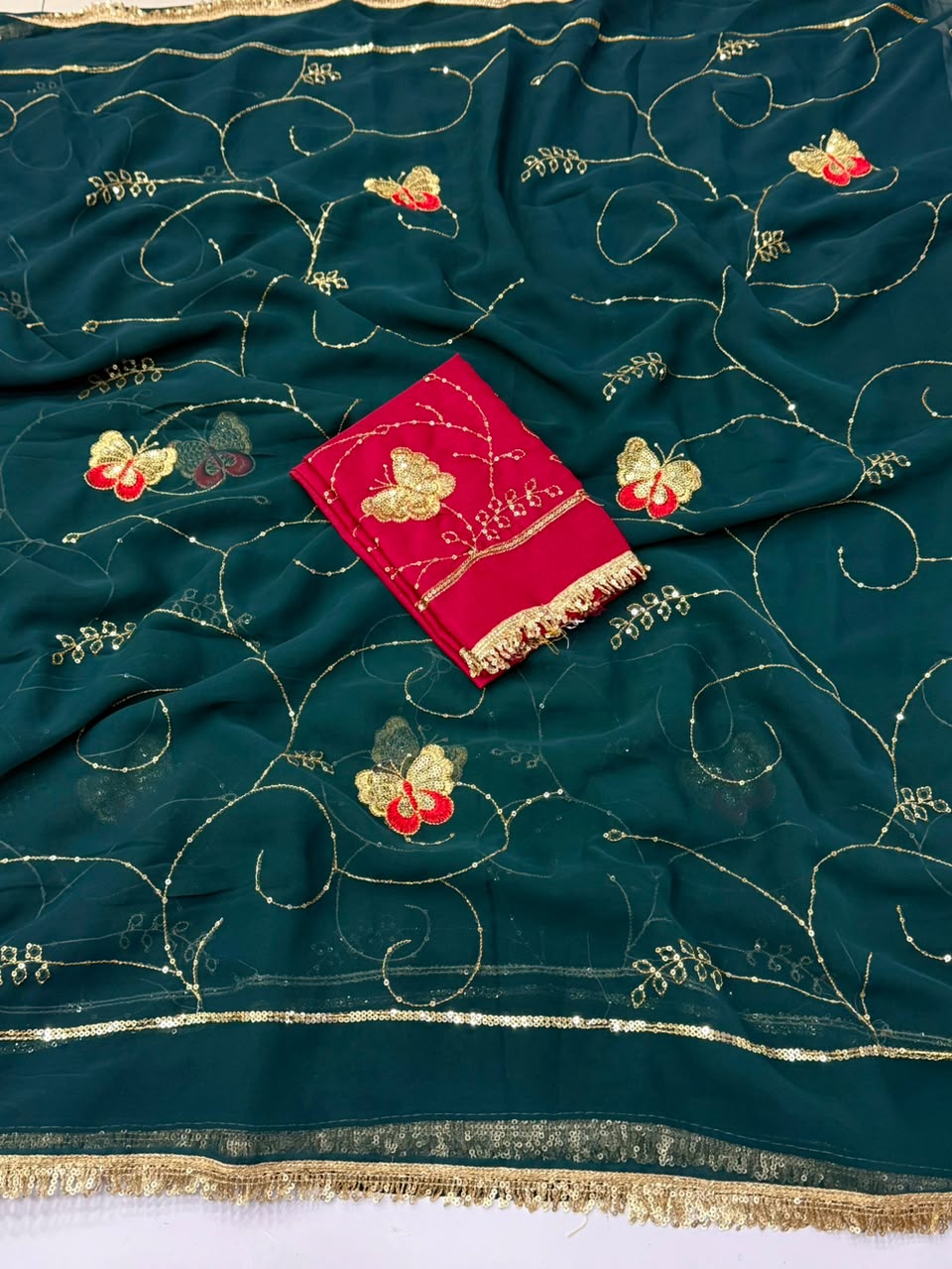 NN-2198 GEORGETTE FABRIC SAREE WITH BEAUTIFUL HEAVY LACE ON BORDER WITH HEAVY SEQUENCE WORK WITH HEAVY WORK BLOUSE