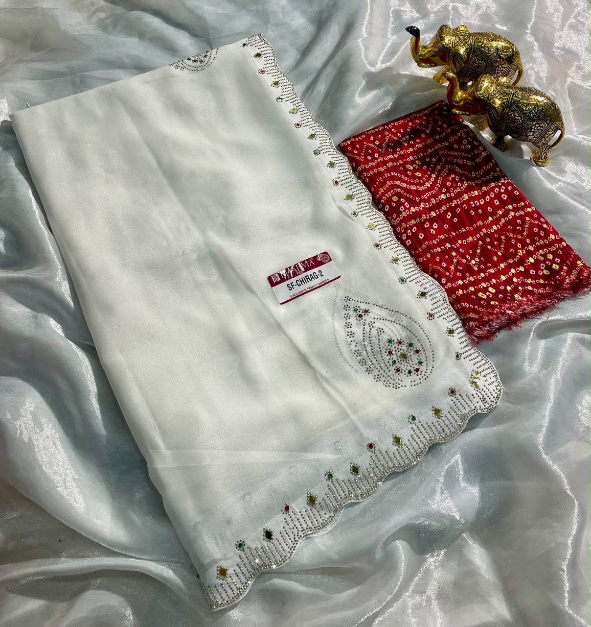 SF-CHIRAG-2 STAR GEORGETTE FABRIC SAREE WITH BEAUTIFUL DESIGN WITH MIRROR WORK WITH DMC SIROSKI WORK WITH BEAUTIFUL CONTRAST BANDHANI DESIGN BLOUSE